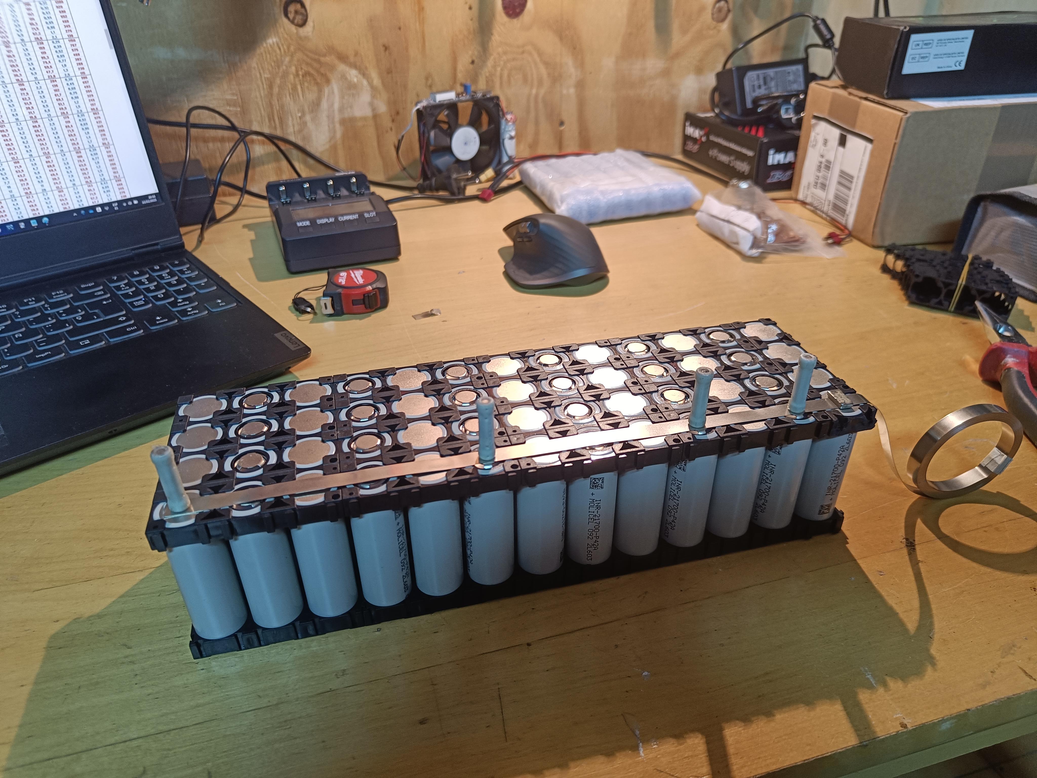 Molicel P42A cells loaded into the holder grid