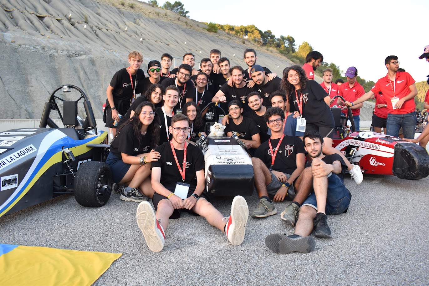 The Ü Motorsport team with the car at competition